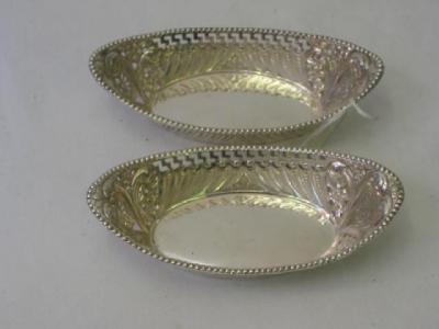 Appraisal: A PAIR OF VICTORIAN BONBON DISHES of oval form with