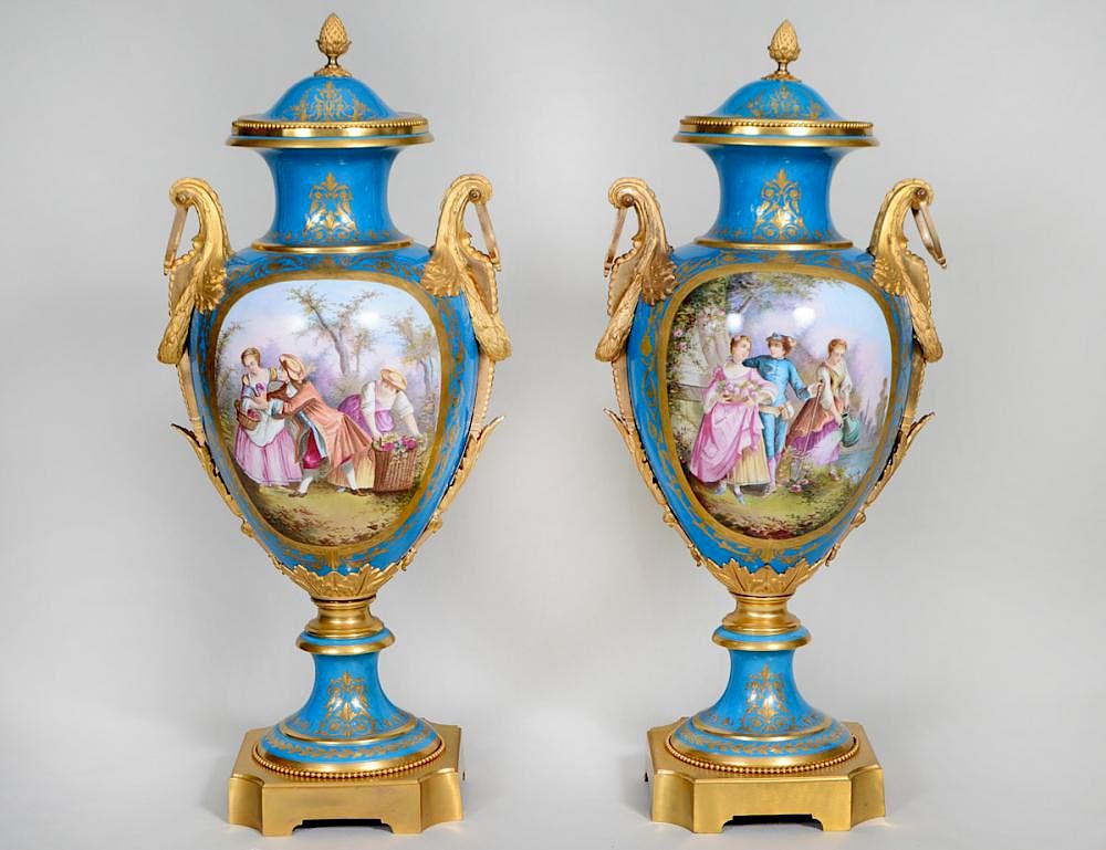 Appraisal: PAIR SEVRES TURQUOISE GROUND PORCELAIN URNS Circa The lids marked