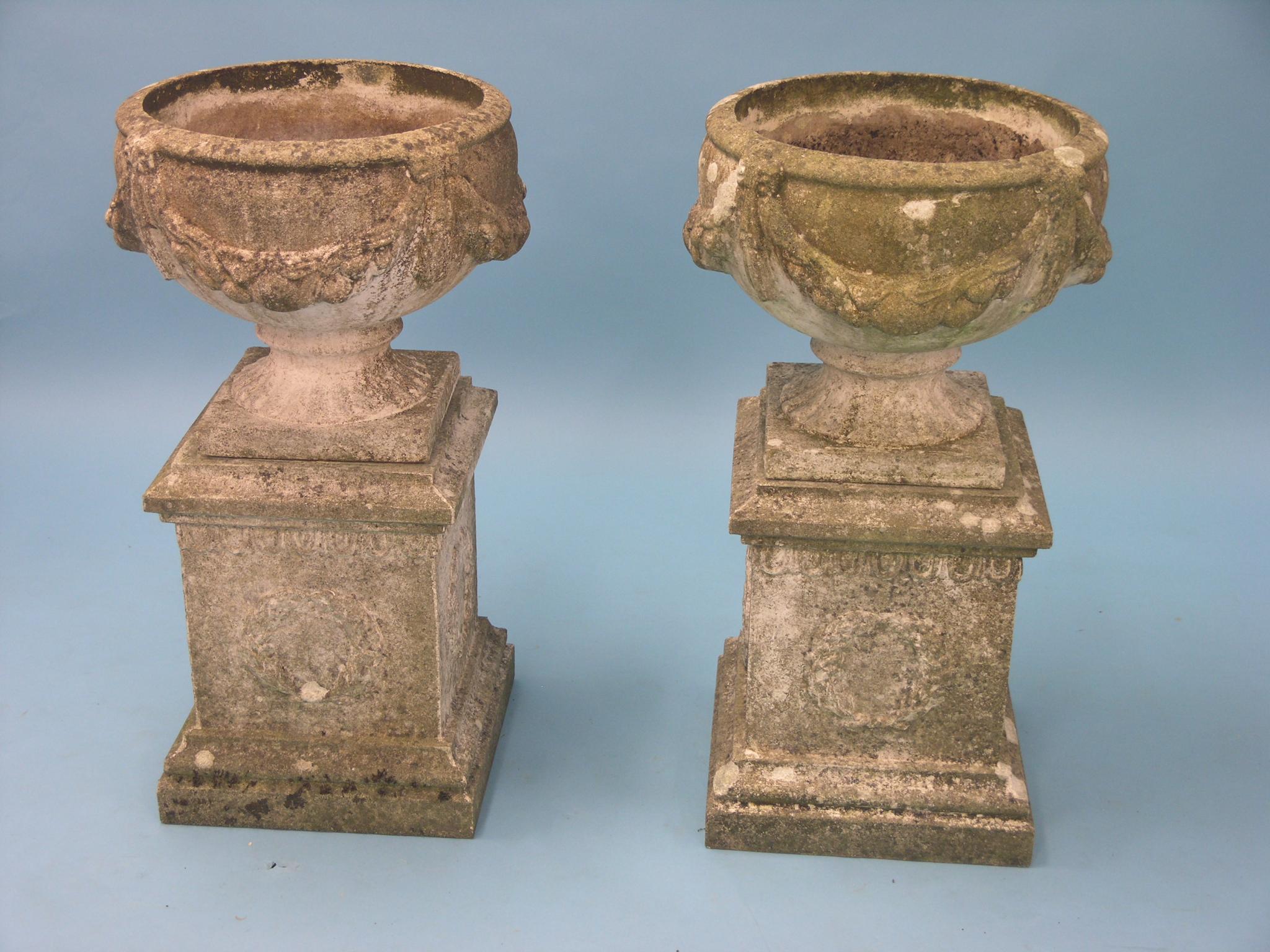 Appraisal: A pair of neo-classical style jardinieres on pedestals ft in