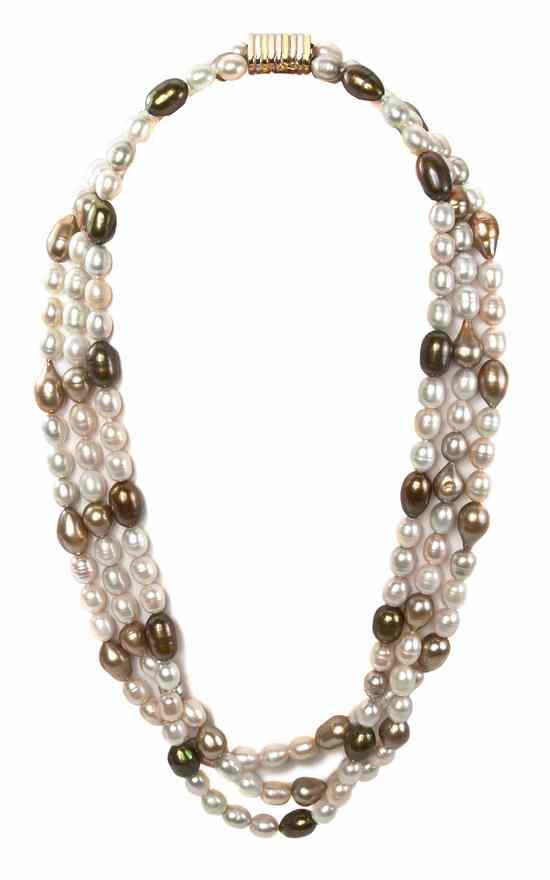 Appraisal: A Triple Strand Cultured Baroque Pearl Necklace consisting of white