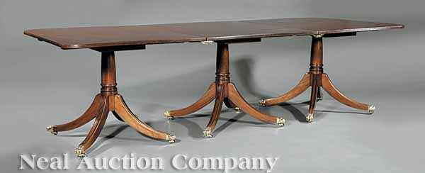 Appraisal: A Regency-Style Mahogany Dining Table top in three parts above