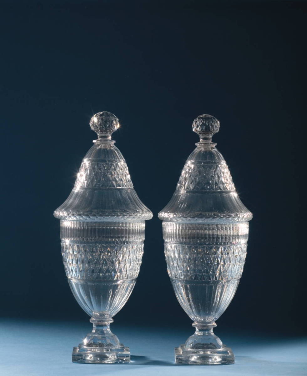 Appraisal: PAIR OF ANGLO-IRISH DIAMOND CUT SWEETMEAT JARS Height inches