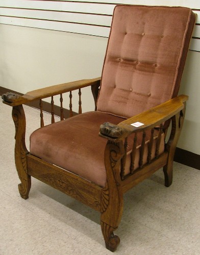 Appraisal: CARVED OAK 'MORRIS' ARMCHAIR American c having a reclining back