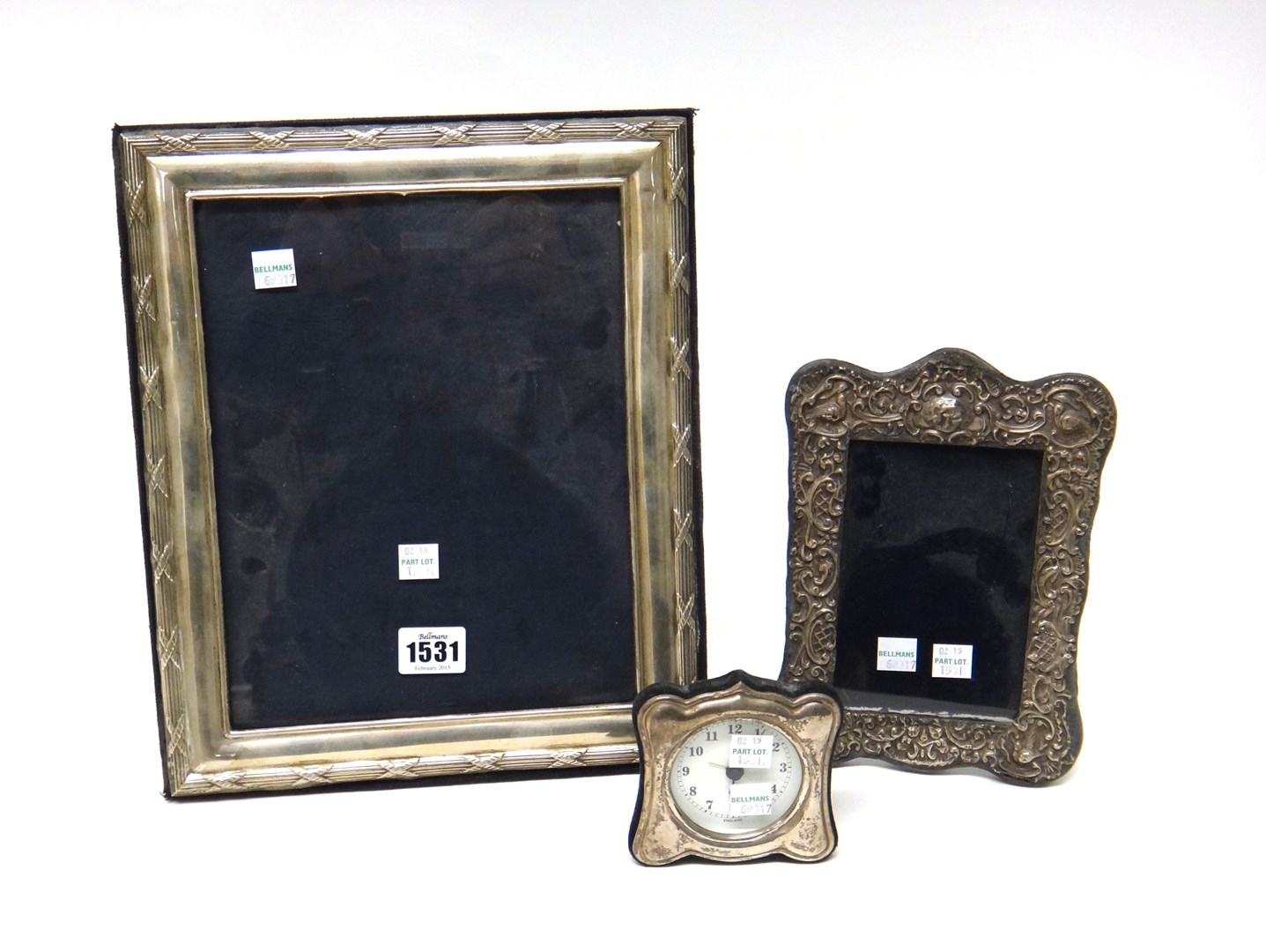 Appraisal: A large shaped rectangular photograph frame apparently unmarked a silver