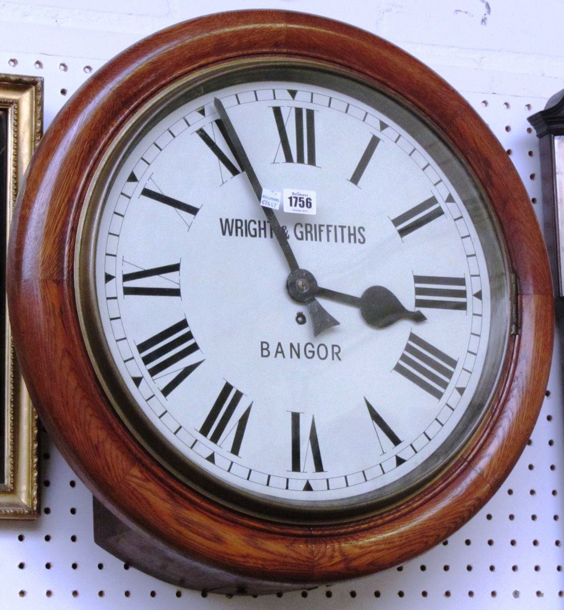 Appraisal: An oak cased dial clock early mid th century the