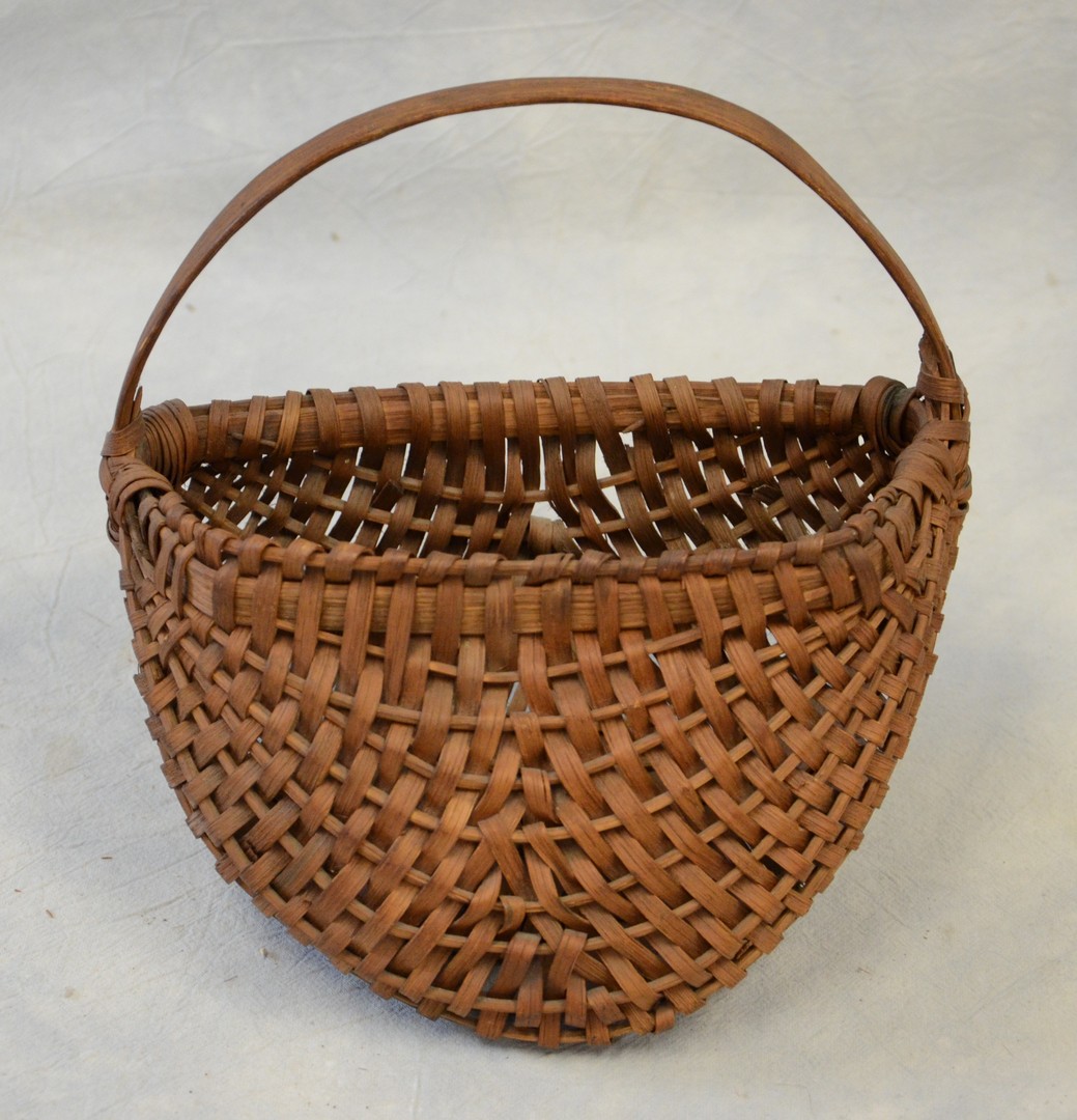 Appraisal: Oak splint half buttocks wall basket wonderful patina c -