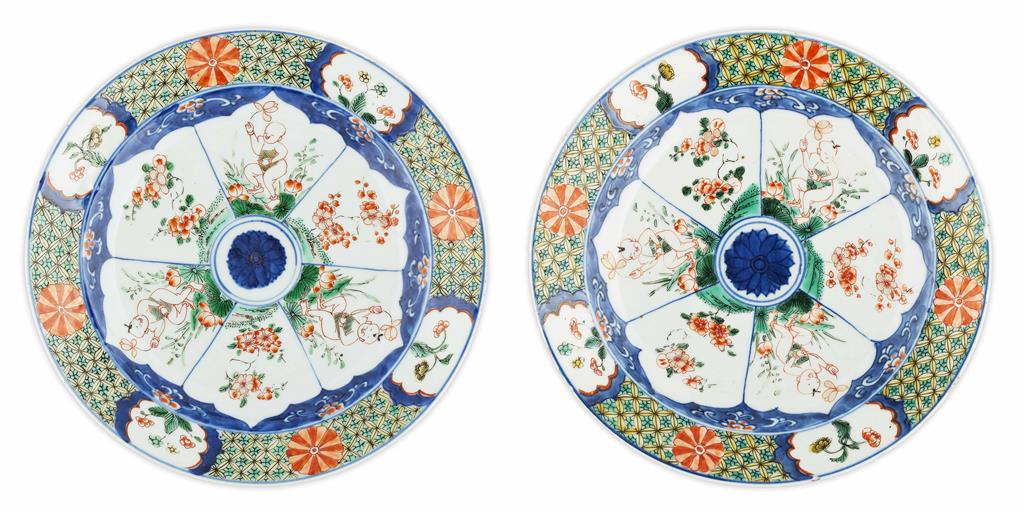 Appraisal: PAIR OF FAMILLE VERTE 'LOTUS BOYS' PLATES KANGXI PERIOD brightly