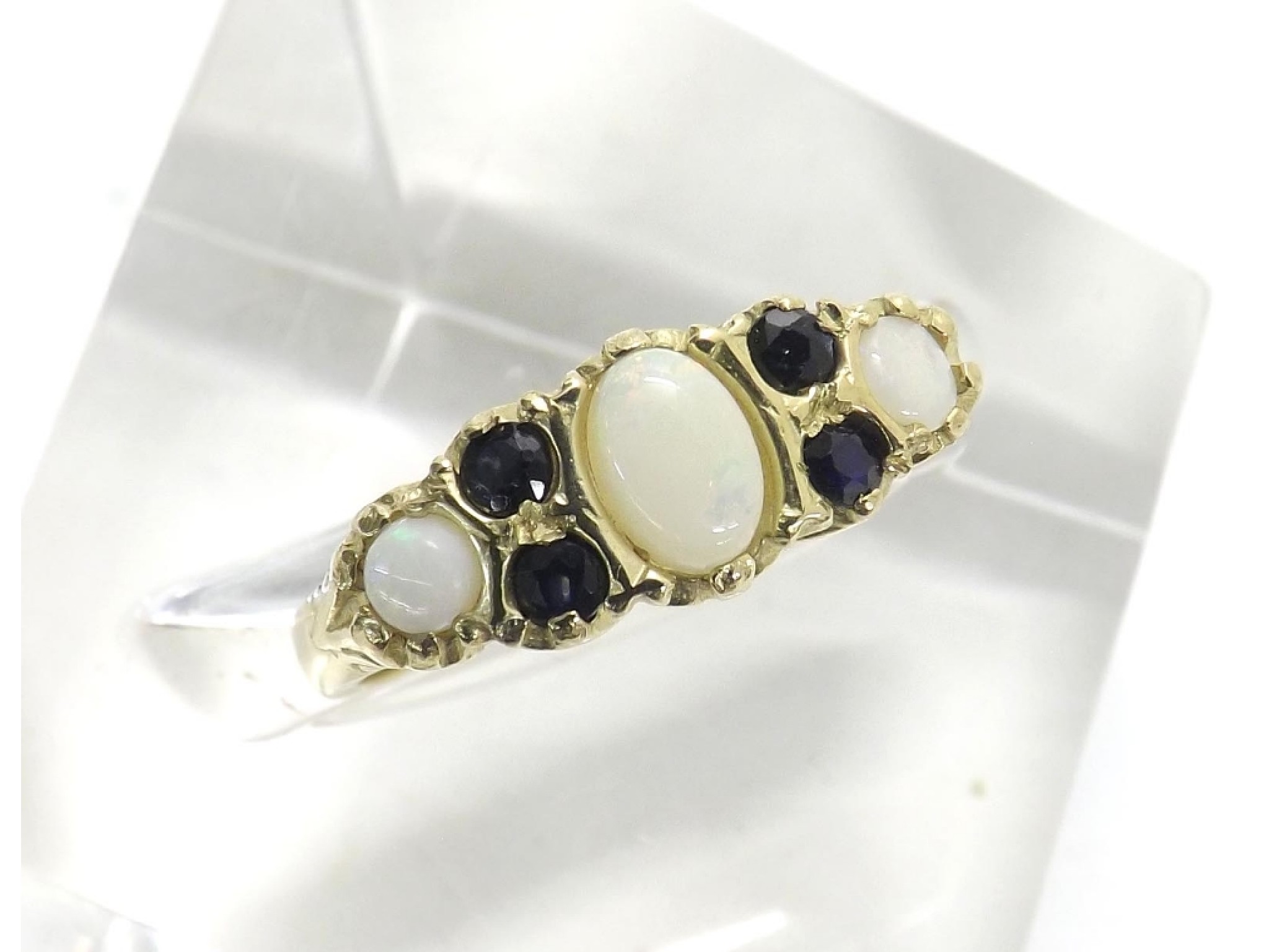 Appraisal: Sapphire and opal ct claw set ring ring size P