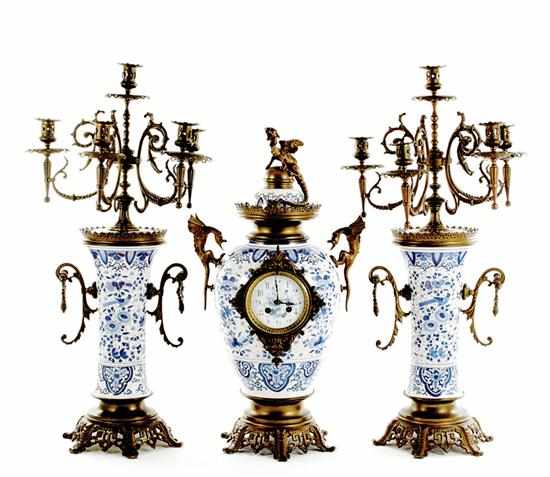 Appraisal: French Delft porcelain clock garniture by Japy Freres late th