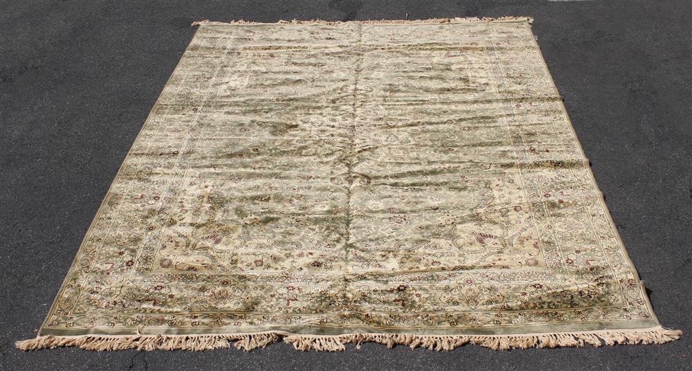 Appraisal: MACHINE MADE TABRIZ DESIGN ORIENTAL WOOL RUG colors include green