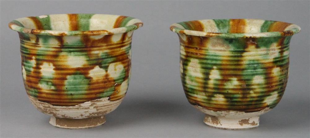 Appraisal: PAIR OF SANCAI-GLAZED POTTERY CUPS TANG DYNASTY - A D