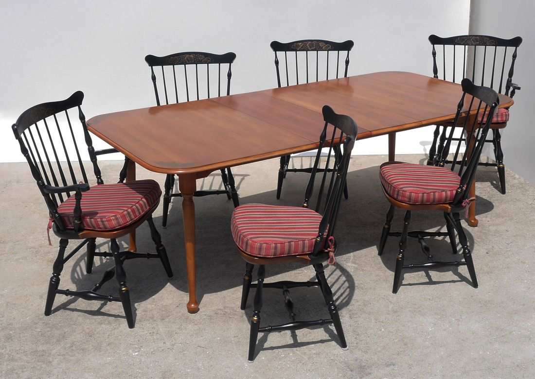 Appraisal: HITCHCOCK DINING TABLE AND CHAIRS Maple table with stenciled design