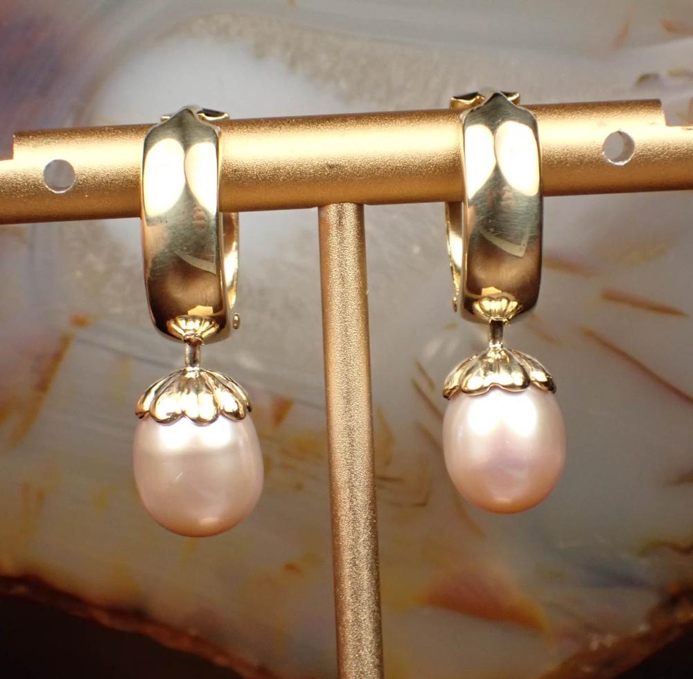 Appraisal: PAIR OF PEARL AND FOURTEEN KARAT GOLD EARRINGS each yellow