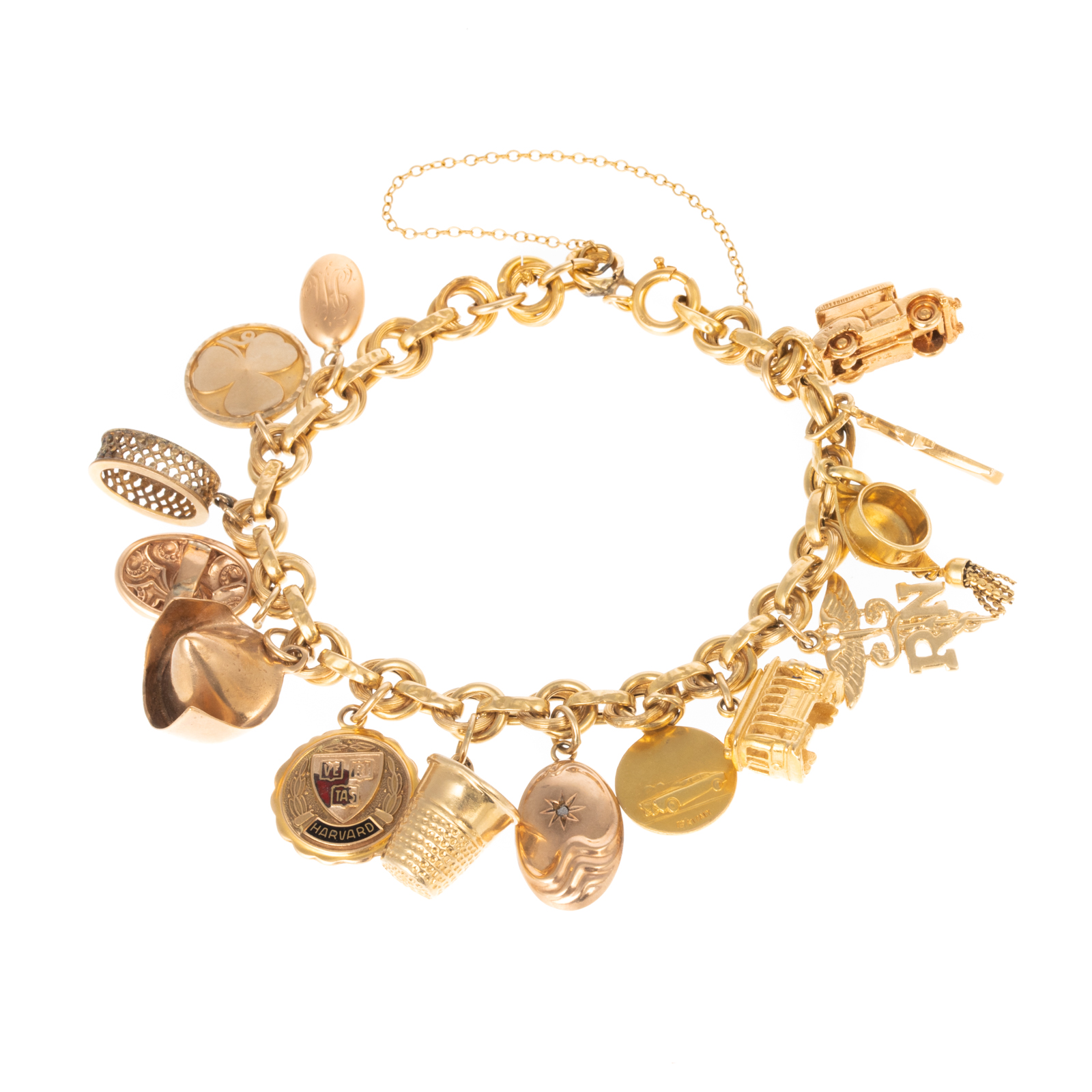 Appraisal: A K YELLOW GOLD CHARM BRACELET WITH CHARMS K yellow