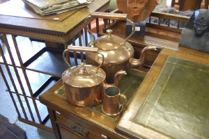 Appraisal: Two Victorian copper and brass kettles a copper coal helmet