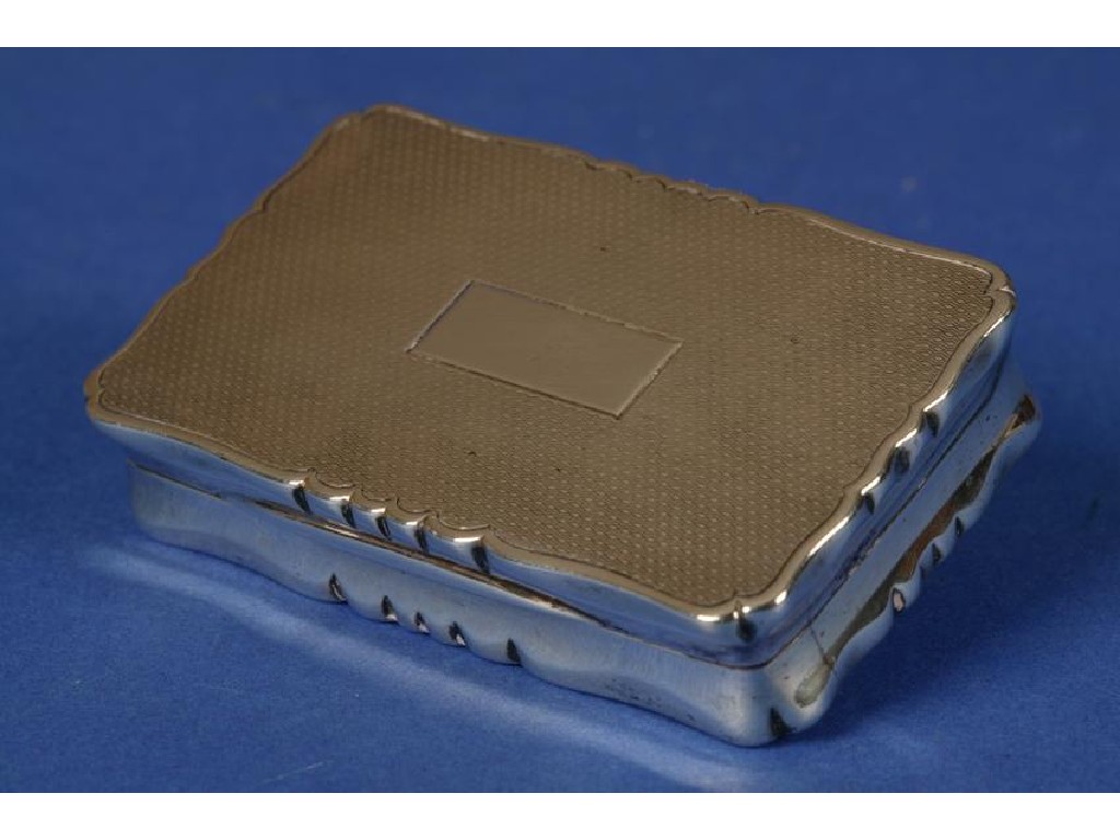 Appraisal: A SILVER SNUFF BOX of shaped rectangular form with an