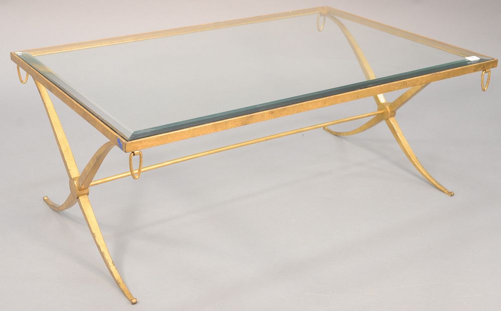 Appraisal: Contemporary glass top coffee table having bevelled glass on a