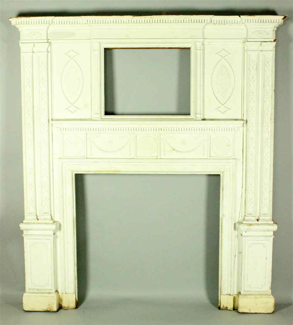 Appraisal: NEOCLASSICAL STYLE WHITE PAINTED PINE FIREPLACE SURROUND the over mantle