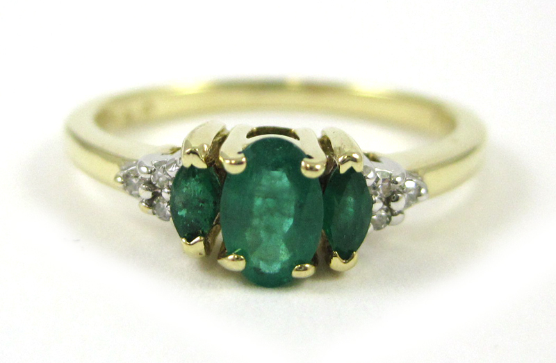 Appraisal: TEN KARAT GOLD EMERALD AND DIAMOND RING approximately ct oval-cut