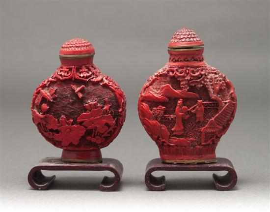 Appraisal: Two similar Chinese carved cinnabar snuff bottles late th century