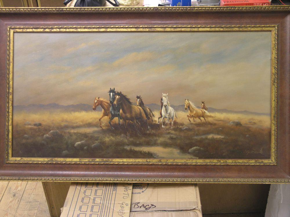 Appraisal: An oil on canvas - running horses against a landscape