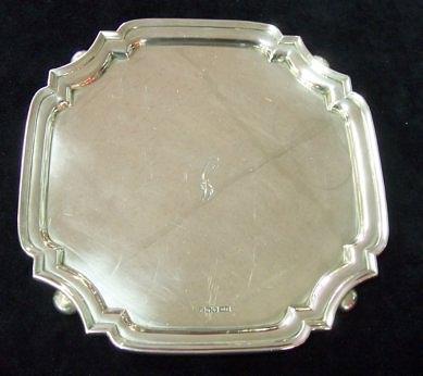 Appraisal: A waiter of square form with concave corners set on