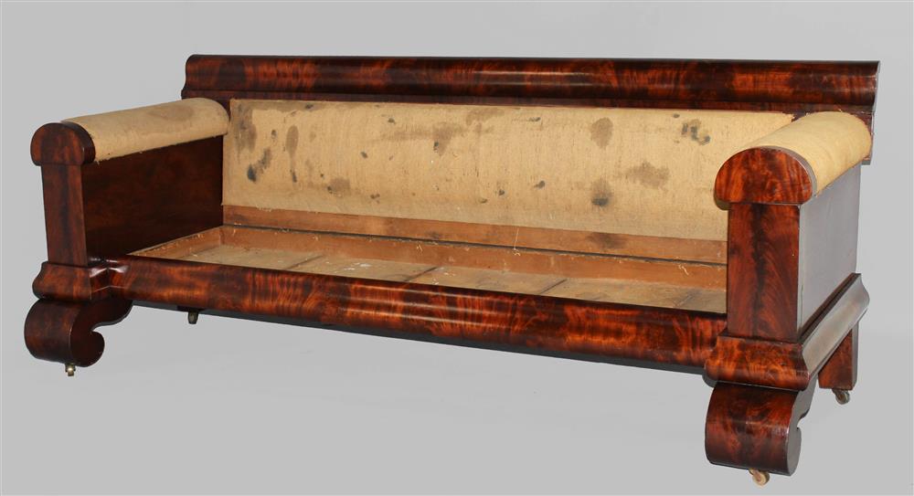 Appraisal: AMERICAN EMPIRE MAHOGANY SOFA FRAME CIRCA the sofa with an