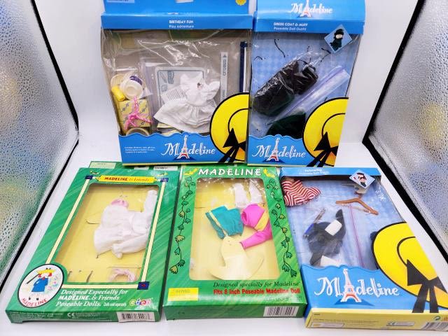 Appraisal: Madeline Doll Outfits in Boxes for doll includes Dress Coat