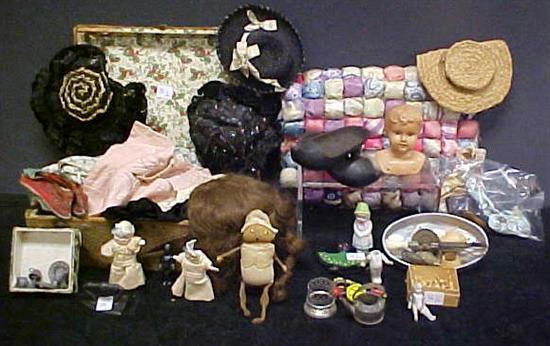 Appraisal: Dolls and accessories including assorted pairs of shoes a brown