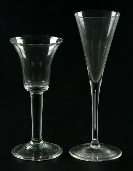 Appraisal: A plain-stemmed toasting glass of drawn trumpet form with elongated