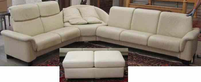 Appraisal: WHITE LEATHER RECLINING SECTIONAL SOFA AND OTTOMAN SET Stressless Paradise