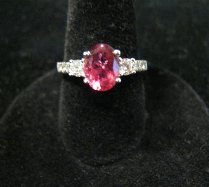 Appraisal: karat white gold diamond and pink sapphire ringOval cut sapphire