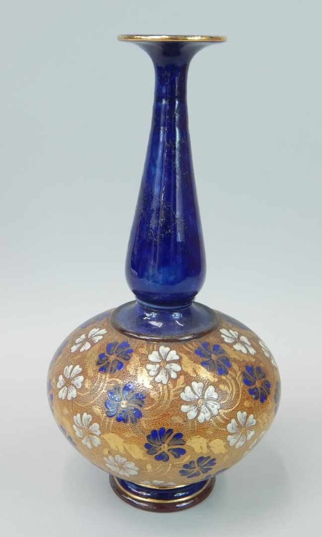 Appraisal: A Doulton Slater's Patent bottle shaped vase decorated with flowers