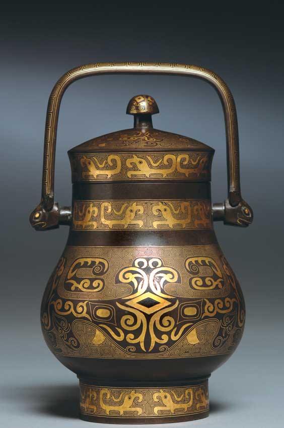 Appraisal: ANTIQUE INLAID BRONZE VESSEL Elaborately detailed antique Chinese Western Zhou-style