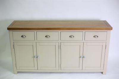 Appraisal: A modern oak dresser base the plain top above four