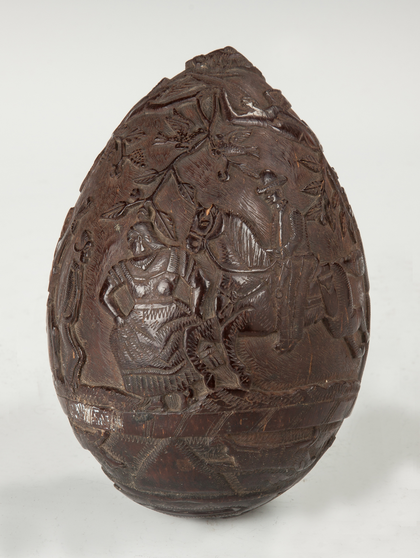 Appraisal: Unusual Carved Coconut Shell Bank With figures eagle angels doves