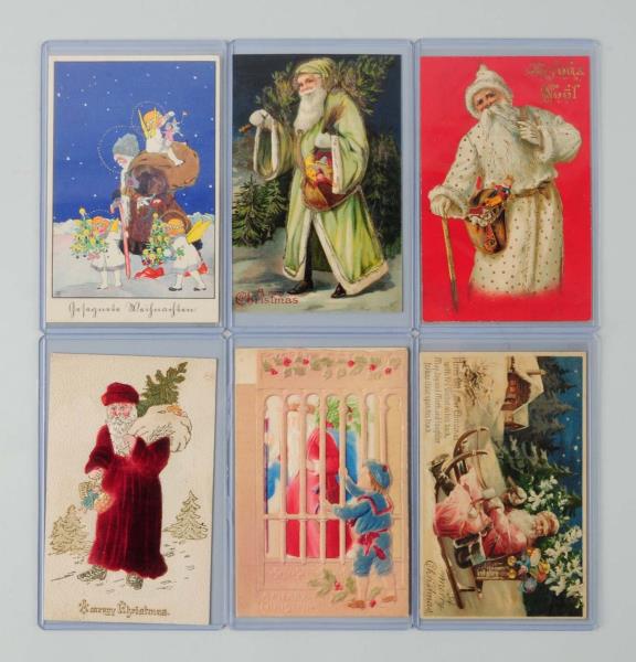 Appraisal: Lot of Santa Postcards Lot has a mechanical cage card