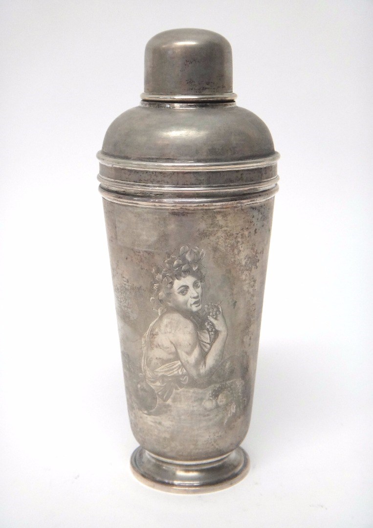 Appraisal: An Italian cocktail shaker of plain tapering form the body