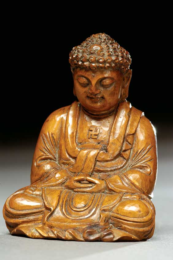 Appraisal: CARVED SANDALWOOD BUDDHA Small Chinese carved sandalwood model of a