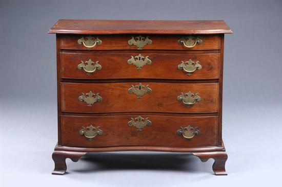 Appraisal: MASSACHUSETTS CHIPPENDALE OXBOW CHEST OF DRAWERS th century walnut Rectangular