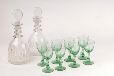 Appraisal: A pair of triple-ring neck decanters and stoppers cm high