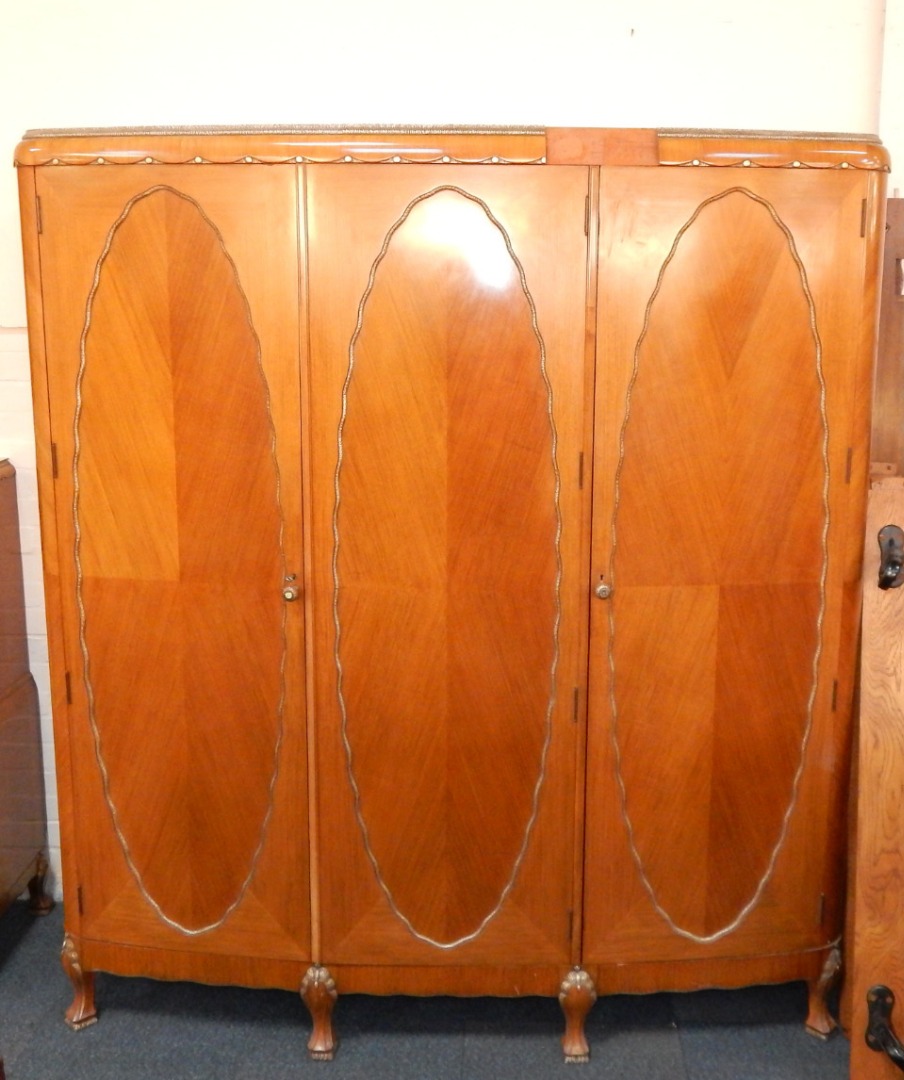 Appraisal: An Art Deco walnut mahogany and faux metal trimmed bedroom