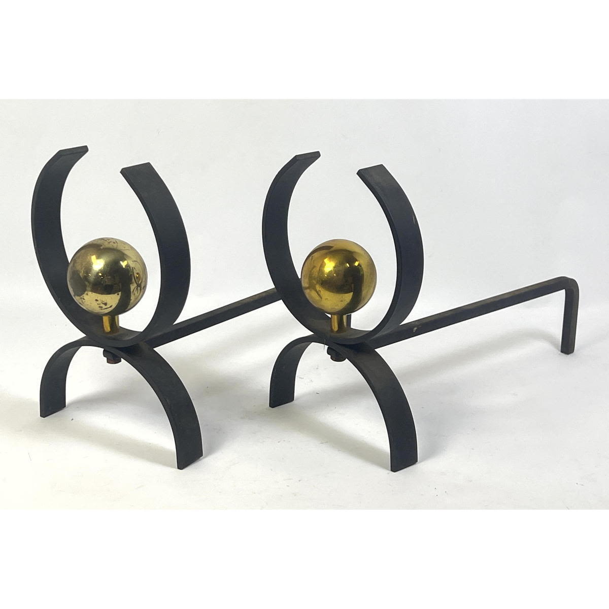 Appraisal: Donald Deskey Andirons Brass Balls and Wrought Iron Dimensions H