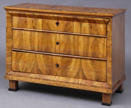 Appraisal: SOUTH GERMAN WALNUT BIEDERMEIER COMMODE The patterned top with applied