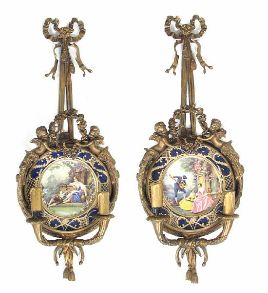 Appraisal: A Louis XV gilt bronze two light girandole with porcelain