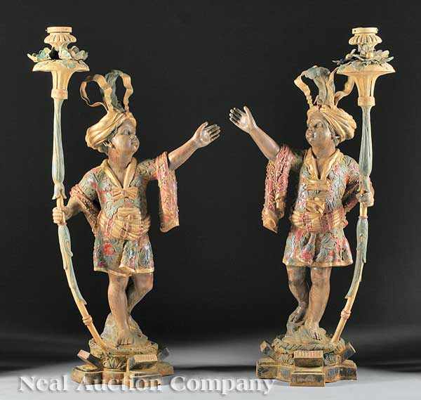 Appraisal: A Pair of Patinated Bronze Blackamoor Figural Torch res each