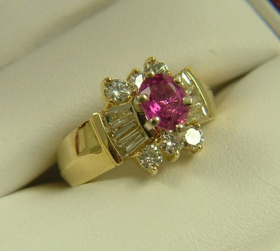 Appraisal: RUBY AND DIAMOND RING K yellow gold estimated weight of