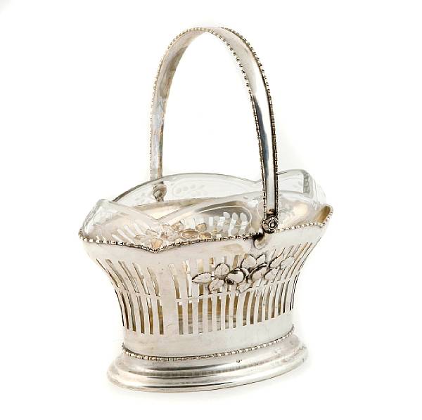 Appraisal: An Austrian standard silver basket frame with engraved glass fittingVienna