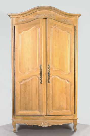 Appraisal: Provincial Louis XV-Style Oak Armoire the domed and molded cornice