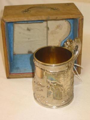 Appraisal: A CHINESE SILVER MUG of mildly tapering form moulded with